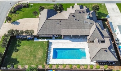 Discover luxury living at its finest in this custom home located on LeTriomphe Golf and Country Club in Louisiana - for sale on GolfHomes.com, golf home, golf lot