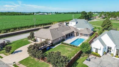 Discover luxury living at its finest in this custom home located on LeTriomphe Golf and Country Club in Louisiana - for sale on GolfHomes.com, golf home, golf lot