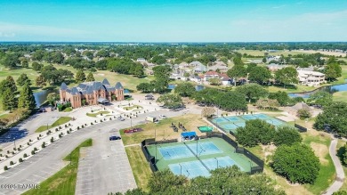 Discover luxury living at its finest in this custom home located on LeTriomphe Golf and Country Club in Louisiana - for sale on GolfHomes.com, golf home, golf lot