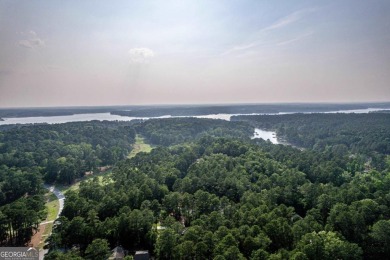 Come and discover this beautiful homesite located in the secure on Reynolds Lake Oconee - The Landing in Georgia - for sale on GolfHomes.com, golf home, golf lot