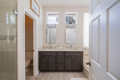 Welcome to this inviting 4-bedroom, 2-bathroom pool home on Innisbrook Resort and Golf Club in Florida - for sale on GolfHomes.com, golf home, golf lot