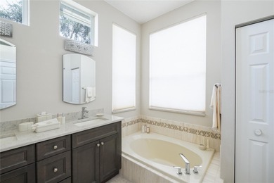 Welcome to this inviting 4-bedroom, 2-bathroom pool home on Innisbrook Resort and Golf Club in Florida - for sale on GolfHomes.com, golf home, golf lot