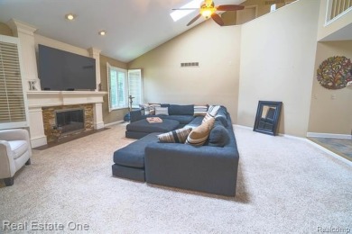 Exceptional 4-bedroom, 3.2-bath. Home in a park-like setting on Fern Hill Country Club in Michigan - for sale on GolfHomes.com, golf home, golf lot