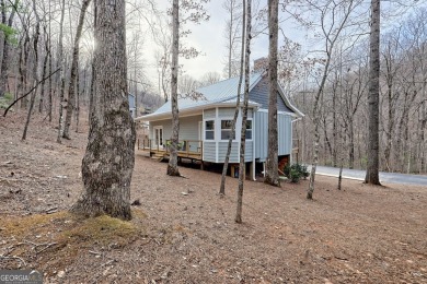 From the moment you step through the front door of this charming on Kingwood Golf Club and Resort in Georgia - for sale on GolfHomes.com, golf home, golf lot