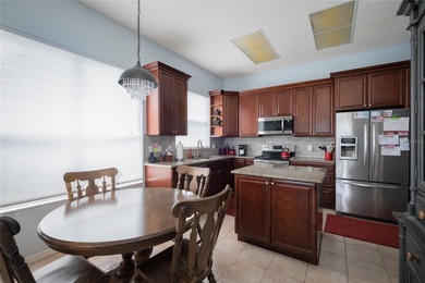 Welcome to this inviting 4-bedroom, 2-bathroom pool home on Innisbrook Resort and Golf Club in Florida - for sale on GolfHomes.com, golf home, golf lot