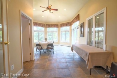 Exceptional 4-bedroom, 3.2-bath. Home in a park-like setting on Fern Hill Country Club in Michigan - for sale on GolfHomes.com, golf home, golf lot