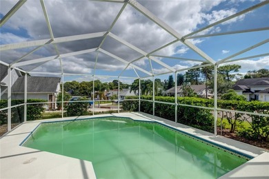 Welcome to this inviting 4-bedroom, 2-bathroom pool home on Innisbrook Resort and Golf Club in Florida - for sale on GolfHomes.com, golf home, golf lot