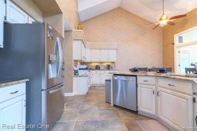 Exceptional 4-bedroom, 3.2-bath. Home in a park-like setting on Fern Hill Country Club in Michigan - for sale on GolfHomes.com, golf home, golf lot
