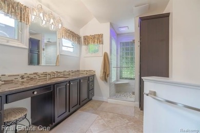 Exceptional 4-bedroom, 3.2-bath. Home in a park-like setting on Fern Hill Country Club in Michigan - for sale on GolfHomes.com, golf home, golf lot