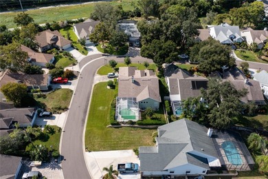 Welcome to this inviting 4-bedroom, 2-bathroom pool home on Innisbrook Resort and Golf Club in Florida - for sale on GolfHomes.com, golf home, golf lot