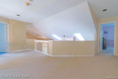 Exceptional 4-bedroom, 3.2-bath. Home in a park-like setting on Fern Hill Country Club in Michigan - for sale on GolfHomes.com, golf home, golf lot