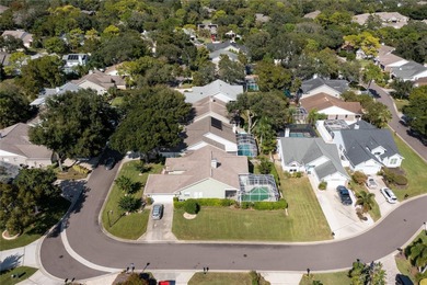 Welcome to this inviting 4-bedroom, 2-bathroom pool home on Innisbrook Resort and Golf Club in Florida - for sale on GolfHomes.com, golf home, golf lot