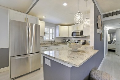 Coastal charm meets carefree living in this fully updated on Kings Point Golf - Executive in Florida - for sale on GolfHomes.com, golf home, golf lot