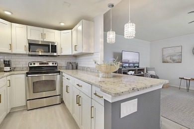 Coastal charm meets carefree living in this fully updated on Kings Point Golf - Executive in Florida - for sale on GolfHomes.com, golf home, golf lot