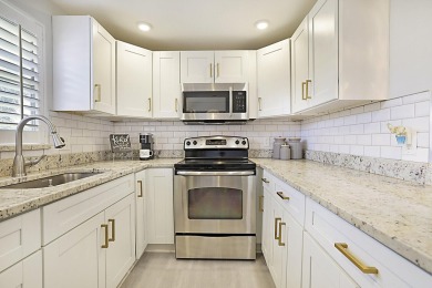 Coastal charm meets carefree living in this fully updated on Kings Point Golf - Executive in Florida - for sale on GolfHomes.com, golf home, golf lot