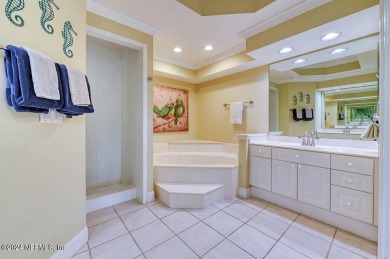 Elegantly appointed 4-bedroom, 4-full bath condominium in The on Slammer and Squire Golf Course in Florida - for sale on GolfHomes.com, golf home, golf lot