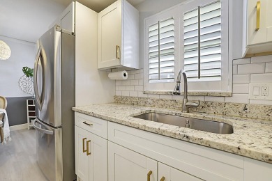 Coastal charm meets carefree living in this fully updated on Kings Point Golf - Executive in Florida - for sale on GolfHomes.com, golf home, golf lot