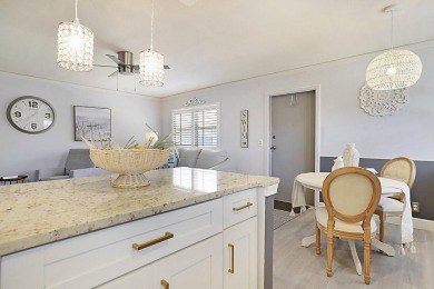 Coastal charm meets carefree living in this fully updated on Kings Point Golf - Executive in Florida - for sale on GolfHomes.com, golf home, golf lot
