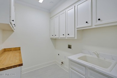 This fully renovated, spacious 5 bedroom, 4 bath home offers on Whisper Lake Country Club in Mississippi - for sale on GolfHomes.com, golf home, golf lot
