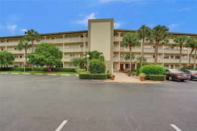 Welcome to your new home in the beautiful community of Wynmoor! on Wynmoor Golf Course in Florida - for sale on GolfHomes.com, golf home, golf lot