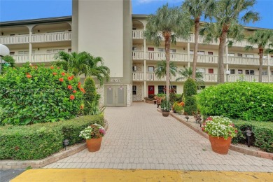 Welcome to your new home in the beautiful community of Wynmoor! on Wynmoor Golf Course in Florida - for sale on GolfHomes.com, golf home, golf lot