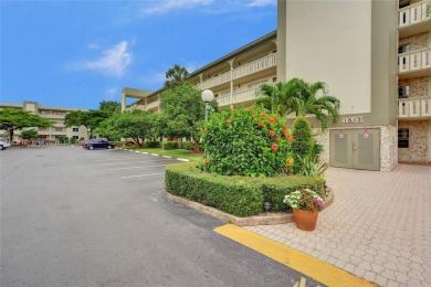 Welcome to your new home in the beautiful community of Wynmoor! on Wynmoor Golf Course in Florida - for sale on GolfHomes.com, golf home, golf lot