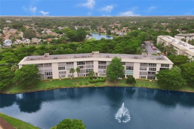 Welcome to your new home in the beautiful community of Wynmoor! on Wynmoor Golf Course in Florida - for sale on GolfHomes.com, golf home, golf lot