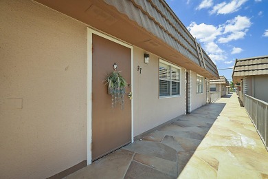 Coastal charm meets carefree living in this fully updated on Kings Point Golf - Executive in Florida - for sale on GolfHomes.com, golf home, golf lot