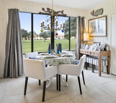 Sheer Elegance. Beautifully renovated 3-BEDROOM, END-UNIT condo on Miles Grant Country Club in Florida - for sale on GolfHomes.com, golf home, golf lot