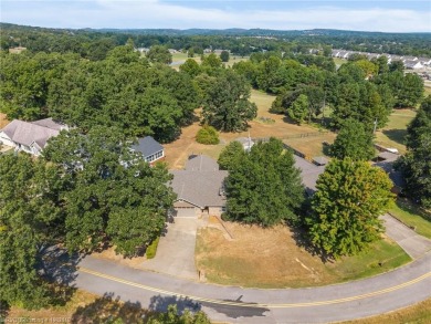 This 2,112 sq ft and 3 bed/2 bath family-friendly home is on Vache-Grasse Country Club in Arkansas - for sale on GolfHomes.com, golf home, golf lot