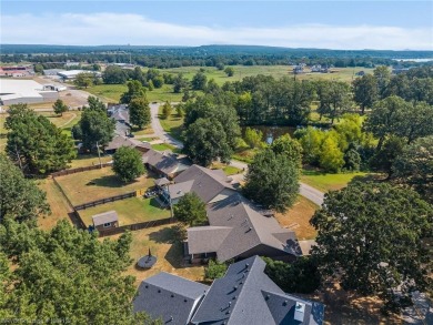 This 2,112 sq ft and 3 bed/2 bath family-friendly home is on Vache-Grasse Country Club in Arkansas - for sale on GolfHomes.com, golf home, golf lot