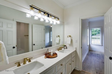 This fully renovated, spacious 5 bedroom, 4 bath home offers on Whisper Lake Country Club in Mississippi - for sale on GolfHomes.com, golf home, golf lot