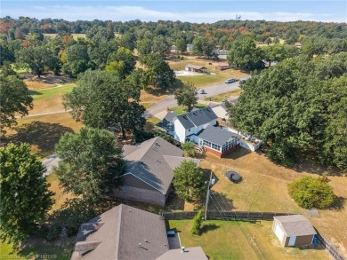 This 2,112 sq ft and 3 bed/2 bath family-friendly home is on Vache-Grasse Country Club in Arkansas - for sale on GolfHomes.com, golf home, golf lot