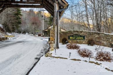 DISCOVER THE ULTIMATE MOUNTAIN RETREAT IN WOLF LAUREL! Living in on Wolf Laurel Country Club in North Carolina - for sale on GolfHomes.com, golf home, golf lot