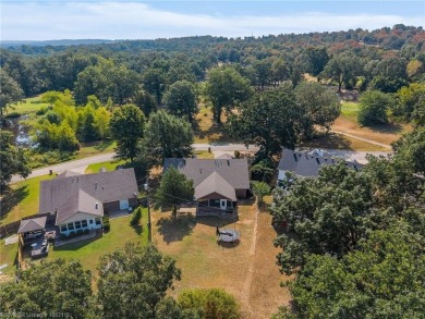 This 2,112 sq ft and 3 bed/2 bath family-friendly home is on Vache-Grasse Country Club in Arkansas - for sale on GolfHomes.com, golf home, golf lot
