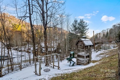 DISCOVER THE ULTIMATE MOUNTAIN RETREAT IN WOLF LAUREL! Living in on Wolf Laurel Country Club in North Carolina - for sale on GolfHomes.com, golf home, golf lot