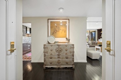 Upon entering this beautifully two-bedroom, two-bath condo on Desert Island Golf and Country Club in California - for sale on GolfHomes.com, golf home, golf lot