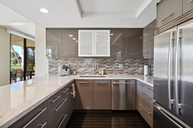Upon entering this beautifully two-bedroom, two-bath condo on Desert Island Golf and Country Club in California - for sale on GolfHomes.com, golf home, golf lot