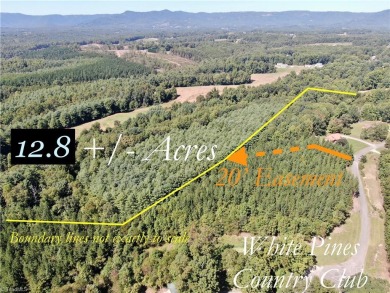 Secluded wooded home site adjoining White Pines Country Club on White Pines Country Club in North Carolina - for sale on GolfHomes.com, golf home, golf lot