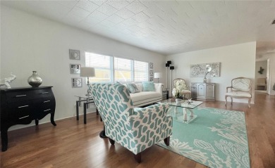 UNDENIABLY BEAUTIFUL HOME LOCATED DIRECTLY ON THE GOLF COURSE on Fairway Village Golf Course in Florida - for sale on GolfHomes.com, golf home, golf lot