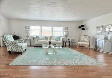UNDENIABLY BEAUTIFUL HOME LOCATED DIRECTLY ON THE GOLF COURSE on Fairway Village Golf Course in Florida - for sale on GolfHomes.com, golf home, golf lot