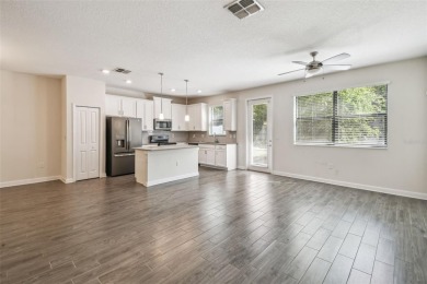 Welcome to this stunning townhome in the sought-after on ChampionsGate Golf Resort in Florida - for sale on GolfHomes.com, golf home, golf lot