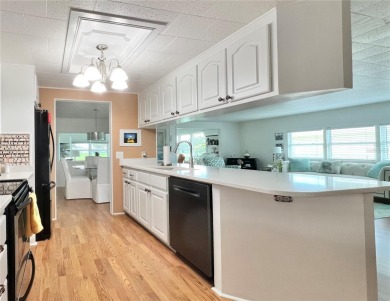 UNDENIABLY BEAUTIFUL HOME LOCATED DIRECTLY ON THE GOLF COURSE on Fairway Village Golf Course in Florida - for sale on GolfHomes.com, golf home, golf lot