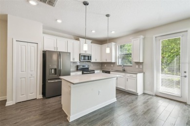 Welcome to this stunning townhome in the sought-after on ChampionsGate Golf Resort in Florida - for sale on GolfHomes.com, golf home, golf lot