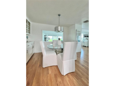 UNDENIABLY BEAUTIFUL HOME LOCATED DIRECTLY ON THE GOLF COURSE on Fairway Village Golf Course in Florida - for sale on GolfHomes.com, golf home, golf lot