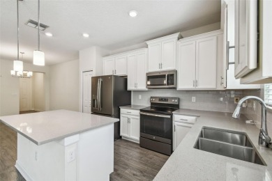 Welcome to this stunning townhome in the sought-after on ChampionsGate Golf Resort in Florida - for sale on GolfHomes.com, golf home, golf lot