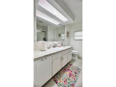 UNDENIABLY BEAUTIFUL HOME LOCATED DIRECTLY ON THE GOLF COURSE on Fairway Village Golf Course in Florida - for sale on GolfHomes.com, golf home, golf lot