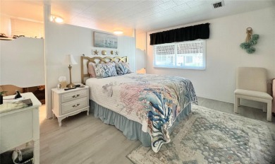 UNDENIABLY BEAUTIFUL HOME LOCATED DIRECTLY ON THE GOLF COURSE on Fairway Village Golf Course in Florida - for sale on GolfHomes.com, golf home, golf lot