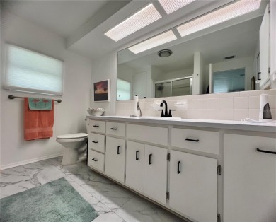 UNDENIABLY BEAUTIFUL HOME LOCATED DIRECTLY ON THE GOLF COURSE on Fairway Village Golf Course in Florida - for sale on GolfHomes.com, golf home, golf lot