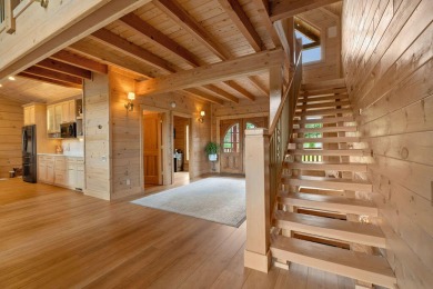 This Luxury Upscale Custom Lakefront Log  Stone Home invites you on Tellico Village -The Links At Kahite Golf Course in Tennessee - for sale on GolfHomes.com, golf home, golf lot
